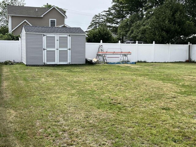 712 Indian Ave, North Cape May, NJ 08204 - fenced backyard with a storage unit