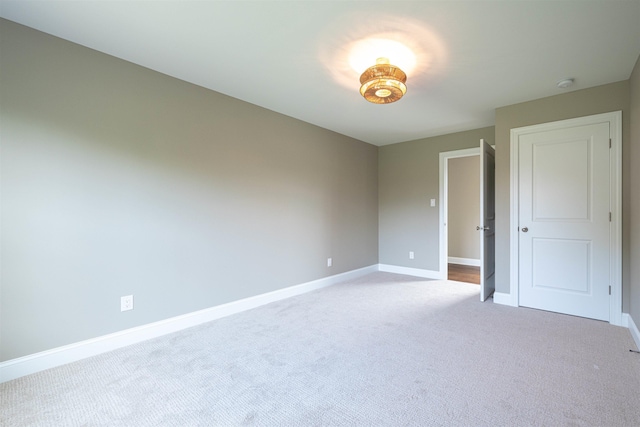 unfurnished bedroom featuring carpet floors