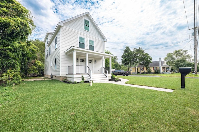 view of front of house featuring a porch and a front lawn