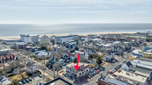 bird's eye view featuring a city view and a water view