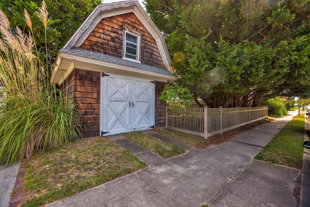 view of outdoor structure with a garage