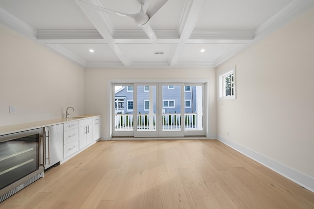 188 34th St, Avalon, NJ 08202 - indoor bar with refrigerator, wine cooler, beam ceiling, coffered ceiling, and light wood-style flooring