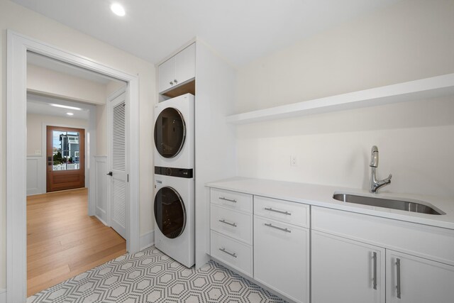 188 34th St, Avalon, NJ 08202 - washroom with stacked washer / dryer, cabinet space, and recessed lighting