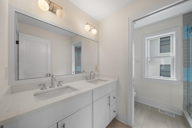 188 34th St, Avalon, NJ 08202 - bathroom featuring double vanity and a shower