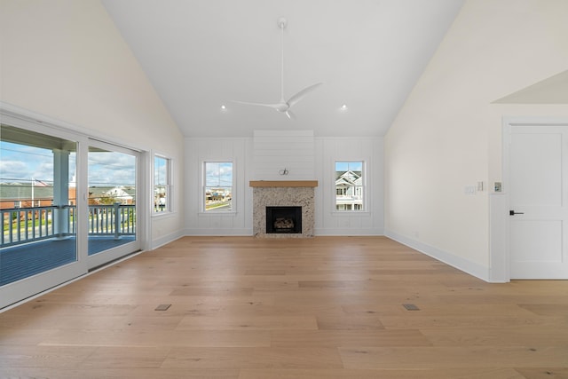 188 34th St, Avalon, NJ 08202 - unfurnished living room featuring high vaulted ceiling, light wood-type flooring, ceiling fan, and a fireplace