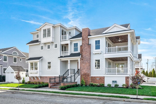 188 34th St, Avalon, NJ 08202 - view of front facade with ceiling fan and a front yard