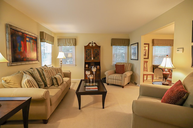 living room with light colored carpet