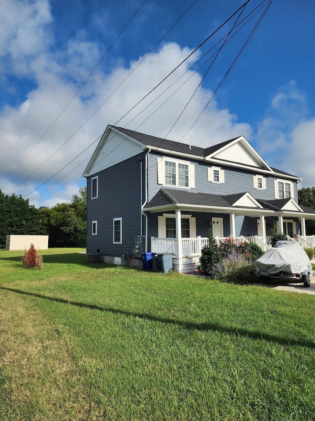 view of front of house featuring a porch and a front lawn