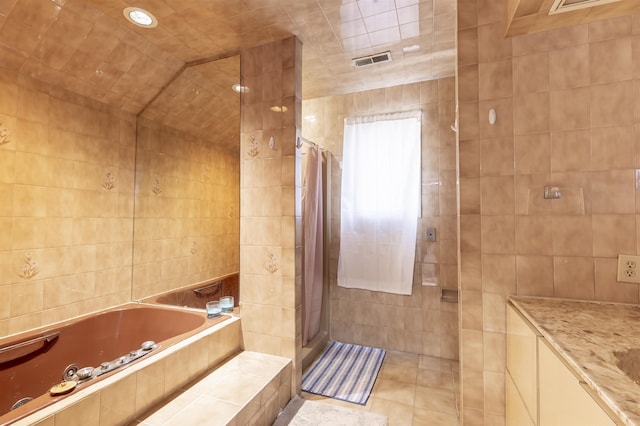6 Rabbit Run, North Cape May, NJ 08204 - bathroom featuring a tile shower, tile patterned floors, tile walls, visible vents, and a bath