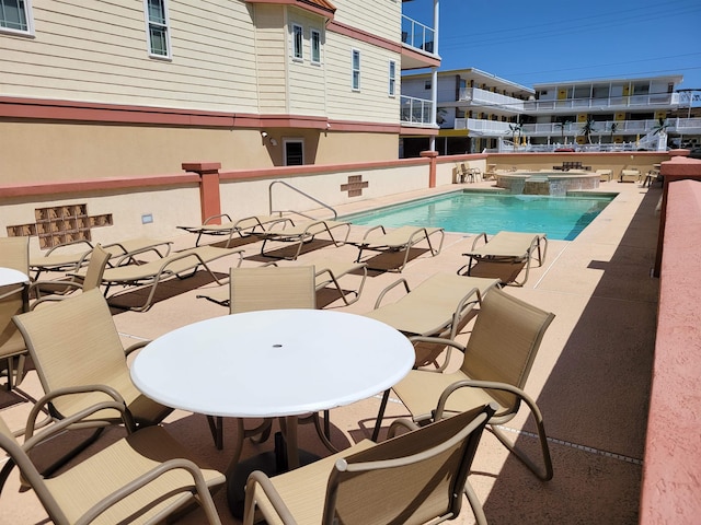 415 E Heather Rd Unit 105, Wildwood Crest, NJ 08260 - view of pool with a pool with connected hot tub and a patio area