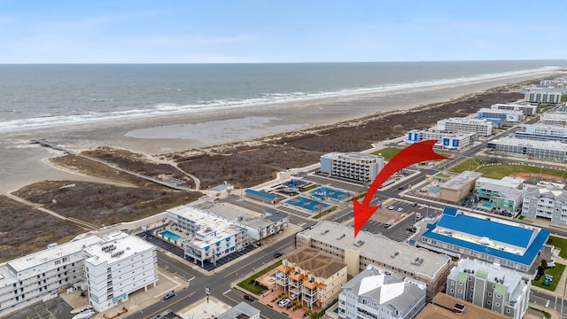 415 E Heather Rd Unit 105, Wildwood Crest, NJ 08260 - bird's eye view of waterfront with a beach