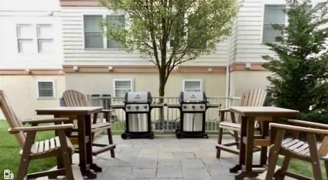 415 E Heather Rd Unit 105, Wildwood Crest, NJ 08260 - view of patio featuring a grill