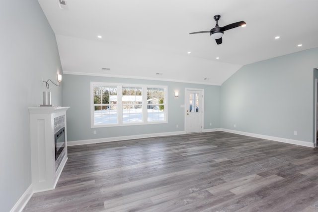 unfurnished living room with ceiling fan, lofted ceiling, and hardwood / wood-style flooring