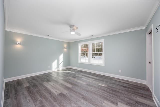 unfurnished room with ceiling fan, dark hardwood / wood-style floors, and ornamental molding