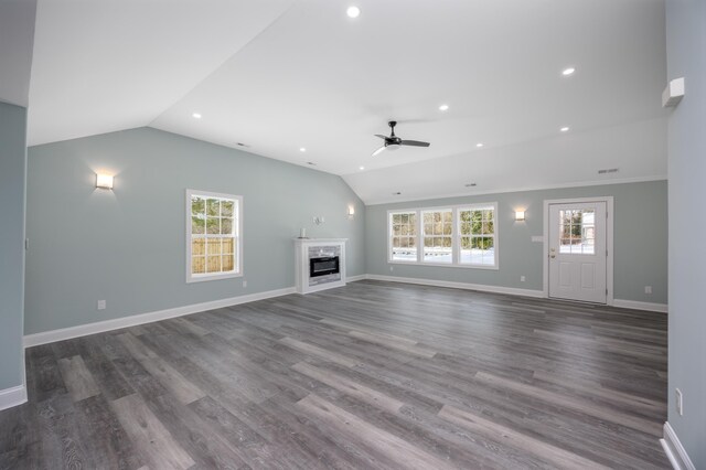 unfurnished living room with dark hardwood / wood-style floors, ceiling fan, and lofted ceiling