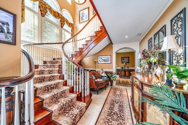 stairs featuring ornamental molding