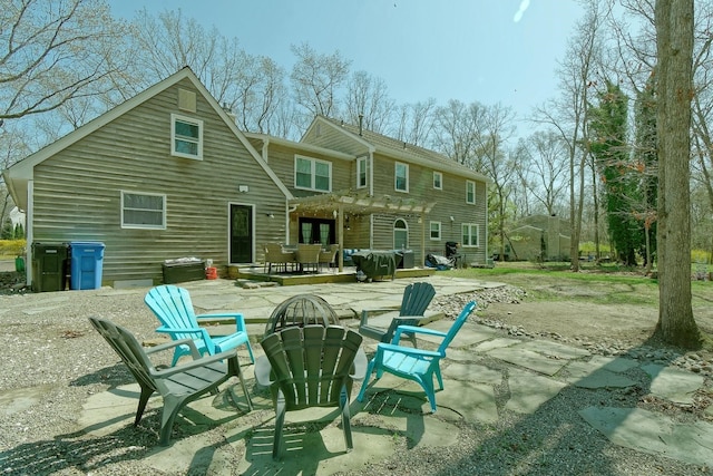 5 Mockingbird Ln, Petersburg, NJ 08270 - back of property with a pergola, a wooden deck, and a chimney