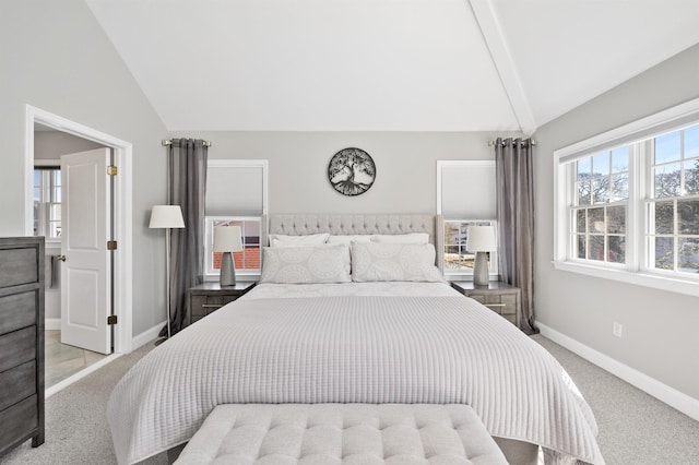 bedroom with light carpet, vaulted ceiling, and baseboards