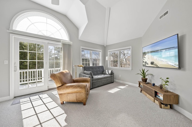 interior space featuring visible vents and vaulted ceiling