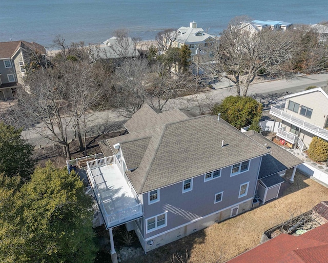 drone / aerial view with a water view