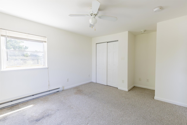 342 S Rte 47, Cape May Court House, NJ 08210 - unfurnished bedroom featuring a baseboard heating unit, carpet, a closet, and baseboards