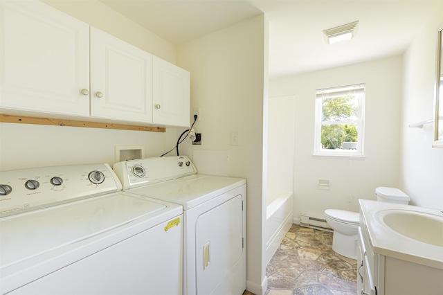 342 S Rte 47, Cape May Court House, NJ 08210 - washroom with independent washer and dryer, a baseboard radiator, and light stone finish floors
