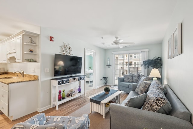410 E Orchid Rd Unit 202, Wildwood Crest, NJ 08260 - living area featuring a ceiling fan and light wood-style floors