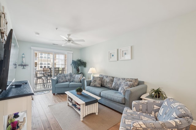 410 E Orchid Rd Unit 202, Wildwood Crest, NJ 08260 - living room featuring a ceiling fan and wood finished floors