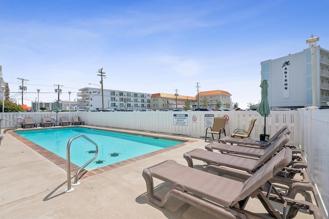410 E Orchid Rd Unit 202, Wildwood Crest, NJ 08260 - community pool with a fenced backyard and a patio