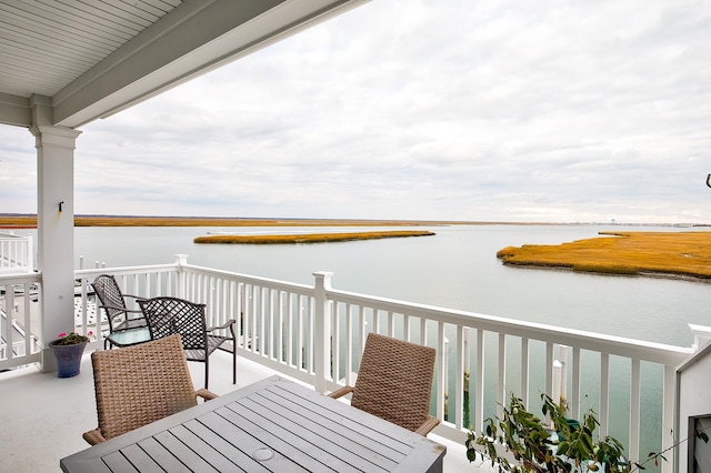 885 21st St W, Unit West, Avalon, NJ 08202 - balcony with outdoor dining area and a water view