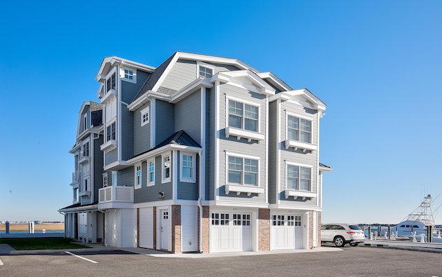 885 21st St W, Unit West, Avalon, NJ 08202 - view of front facade with an attached garage