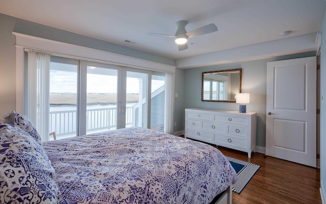 885 21st St W, Unit West, Avalon, NJ 08202 - bedroom featuring access to outside, dark wood finished floors, a water view, and a ceiling fan