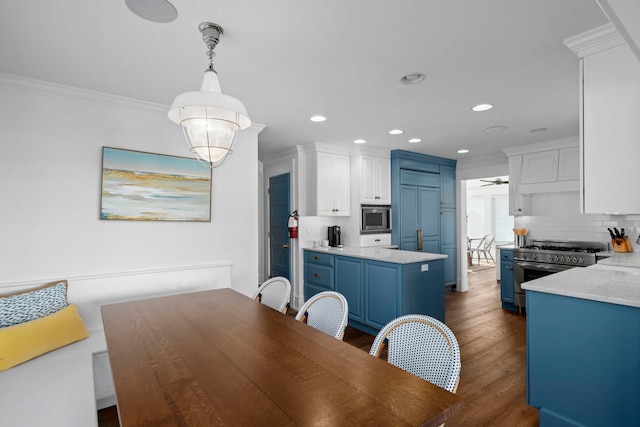 19 Flamingo Dr, Avalon, NJ 08202 - dining area featuring dark hardwood / wood-style floors, ceiling fan, and crown molding