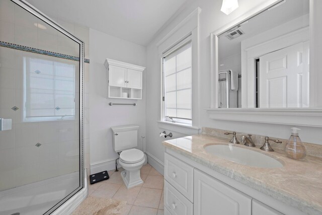 19 Flamingo Dr, Avalon, NJ 08202 - bathroom featuring toilet, tile patterned floors, a shower with door, and a healthy amount of sunlight