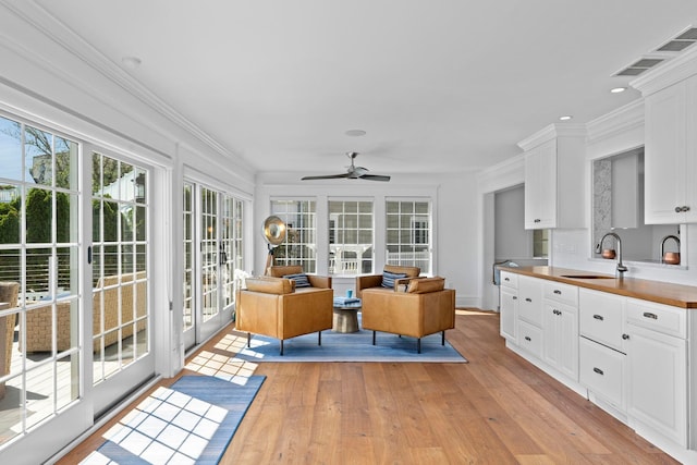 19 Flamingo Dr, Avalon, NJ 08202 - sunroom with ceiling fan and sink