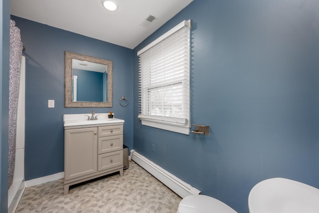 103 Bate Ave, Lower Township, NJ 08204 - bathroom with a baseboard radiator, vanity, and toilet