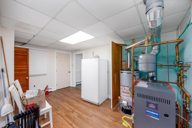 103 Bate Ave, Lower Township, NJ 08204 - utility room with water heater and a baseboard heating unit