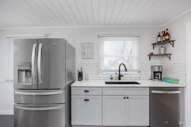103 Bate Ave, Lower Township, NJ 08204 - kitchen with stainless steel appliances, white cabinets, tasteful backsplash, and sink