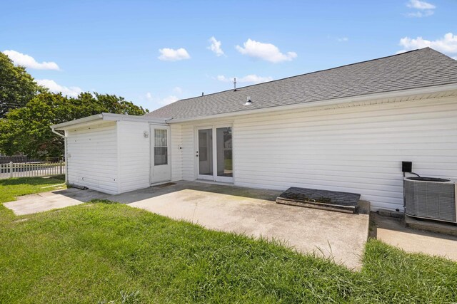 1301 Holmes Ave, North Cape May, NJ 08204 - back of property featuring a shingled roof and a patio area