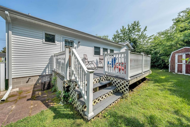 11 S 9th St, Del Haven, NJ 08251 - back of property featuring a storage unit, a lawn, and a deck