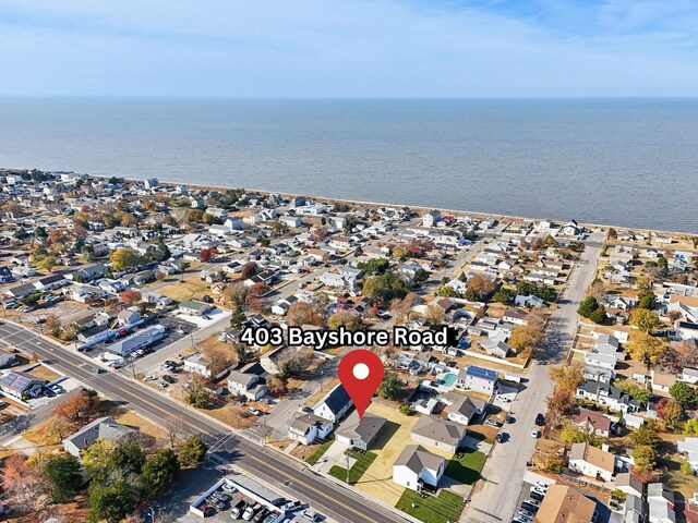 aerial view with a water view and a residential view