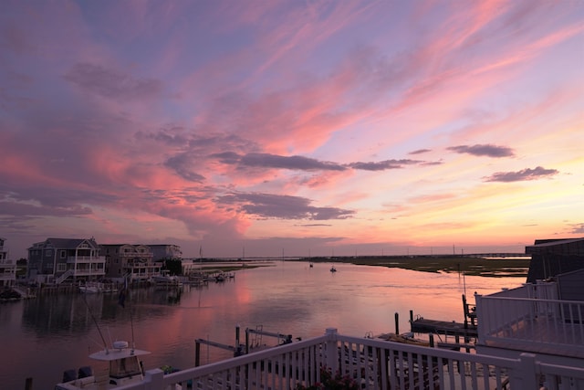 property view of water featuring a boat dock