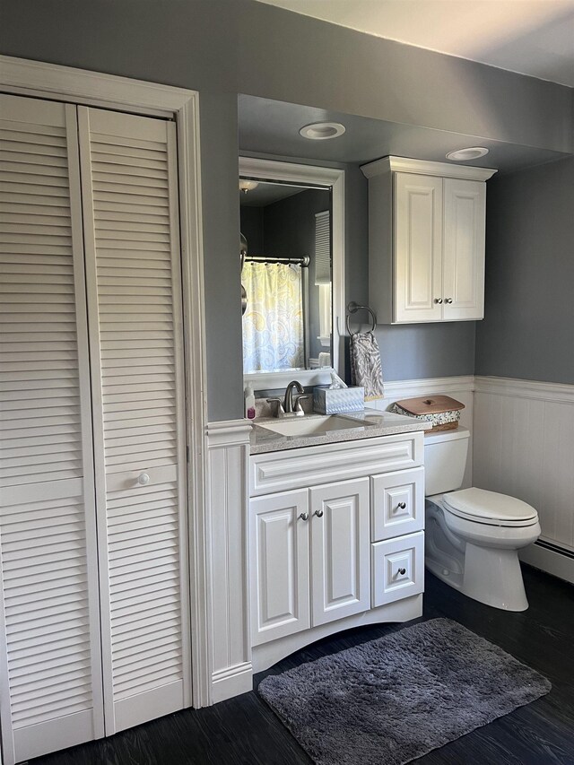 407 Elmwood Ave, Marmora, NJ 08223 - bathroom featuring wood-type flooring, vanity, and toilet