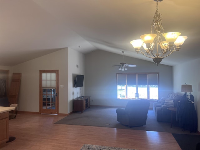 407 Elmwood Ave, Marmora, NJ 08223 - living room featuring lofted ceiling, ceiling fan with notable chandelier, and hardwood / wood-style flooring