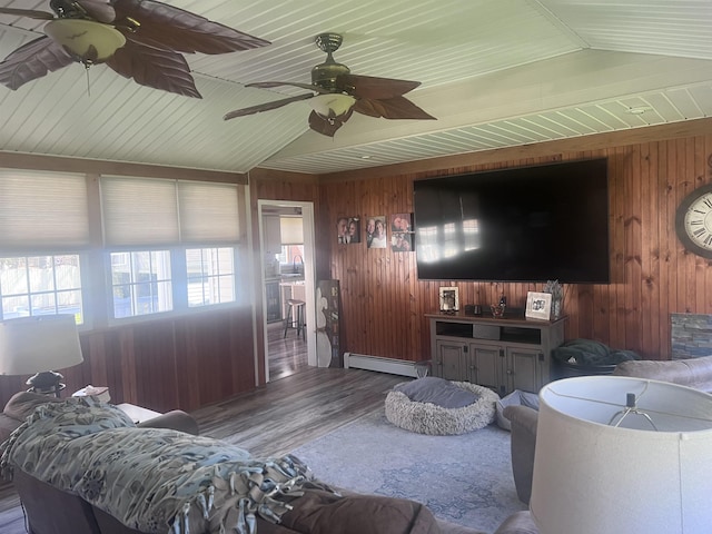 407 Elmwood Ave, Marmora, NJ 08223 - living room featuring sink, a baseboard heating unit, lofted ceiling, wooden walls, and wood ceiling
