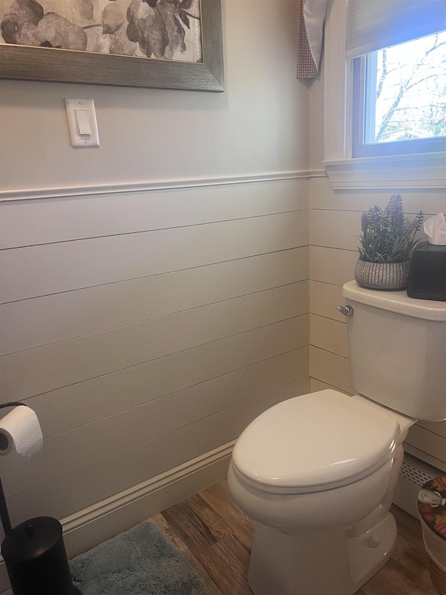 407 Elmwood Ave, Marmora, NJ 08223 - bathroom with hardwood / wood-style floors, toilet, and wooden walls