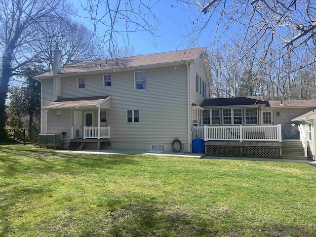 407 Elmwood Ave, Marmora, NJ 08223 - back of house with a wooden deck and a lawn