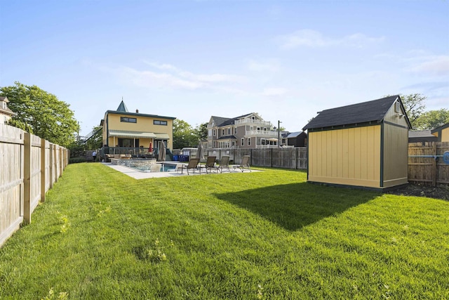 127 Myrtle Ave, West Cape May, NJ 08204 - fenced backyard featuring a storage unit and a patio area