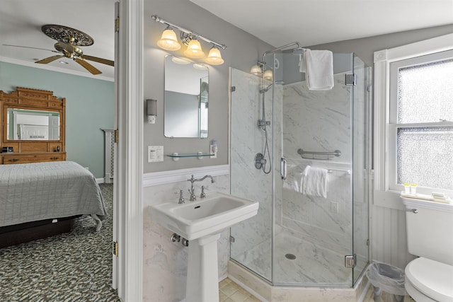 127 Myrtle Ave, West Cape May, NJ 08204 - full bath with a marble finish shower, ceiling fan, healthy amount of natural light, connected bathroom, and ornamental molding