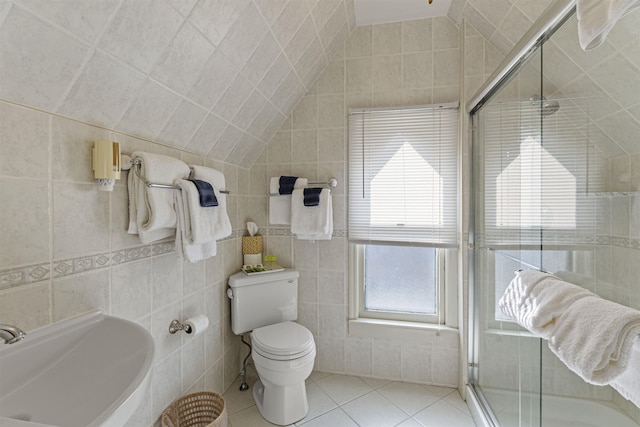 127 Myrtle Ave, West Cape May, NJ 08204 - full bathroom with tile patterned floors, a shower stall, tile walls, and lofted ceiling